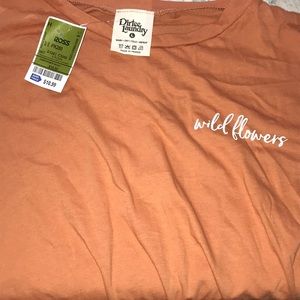 Peach shirt “wild flower” dirtee laundry brand :)